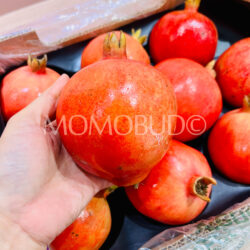 Indian Sweet Red Pomegranate on hand